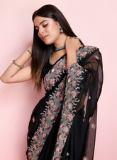 Embroidered black colour saree